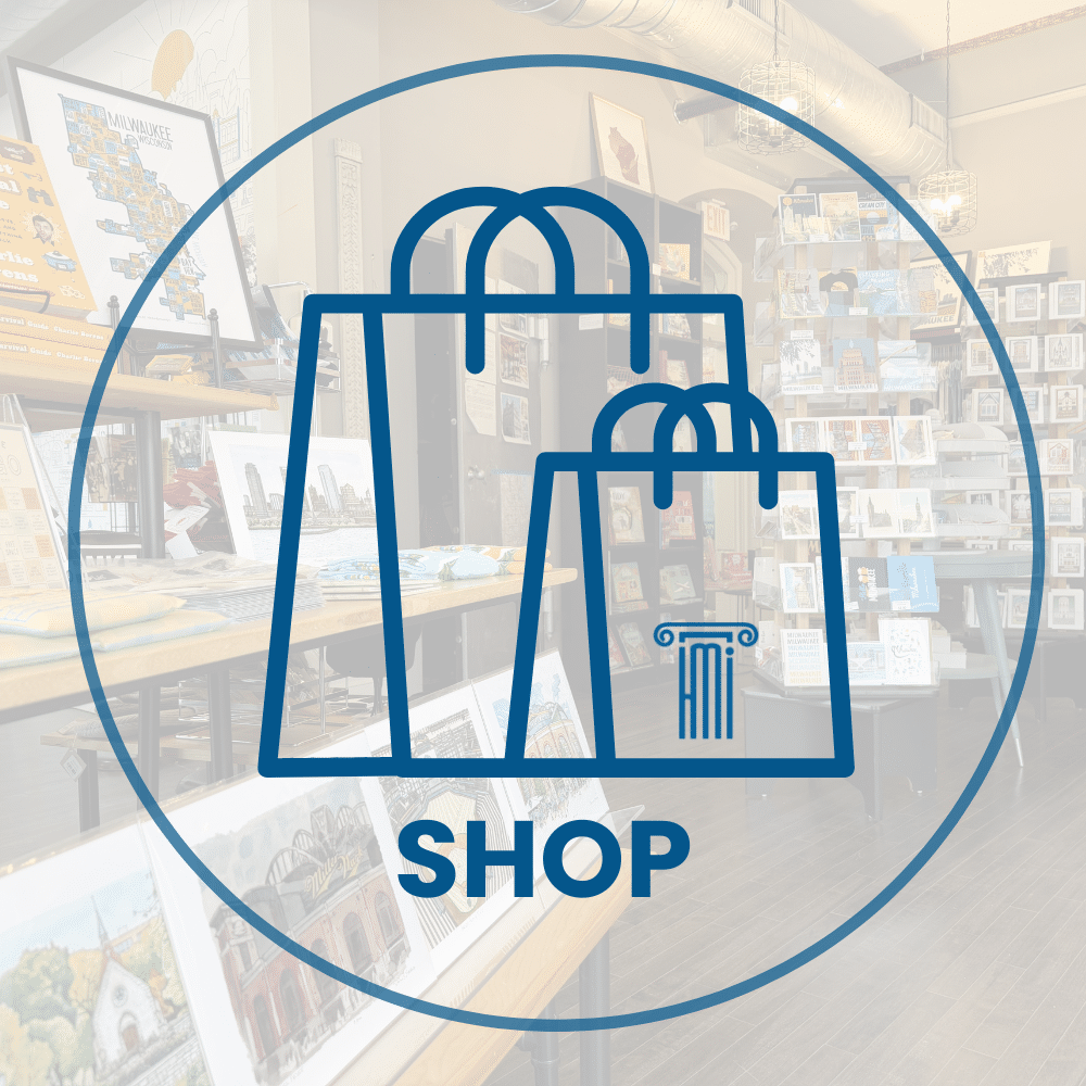 Large blue icon of two shopping bags with the word "SHOP" overlays a background of an art gift shop displaying framed artwork and postcards.
