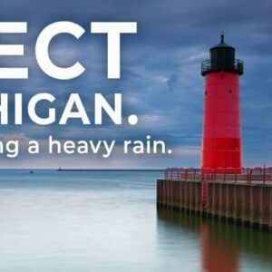 Red lighthouse by Lake Michigan at dusk. Text urges water conservation during heavy rain and provides contact info for Water Drop Alert in English and Spanish.