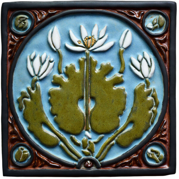 Decorative ceramic tile featuring a green lotus plant with white flowers on a blue background, bordered with brown accents.